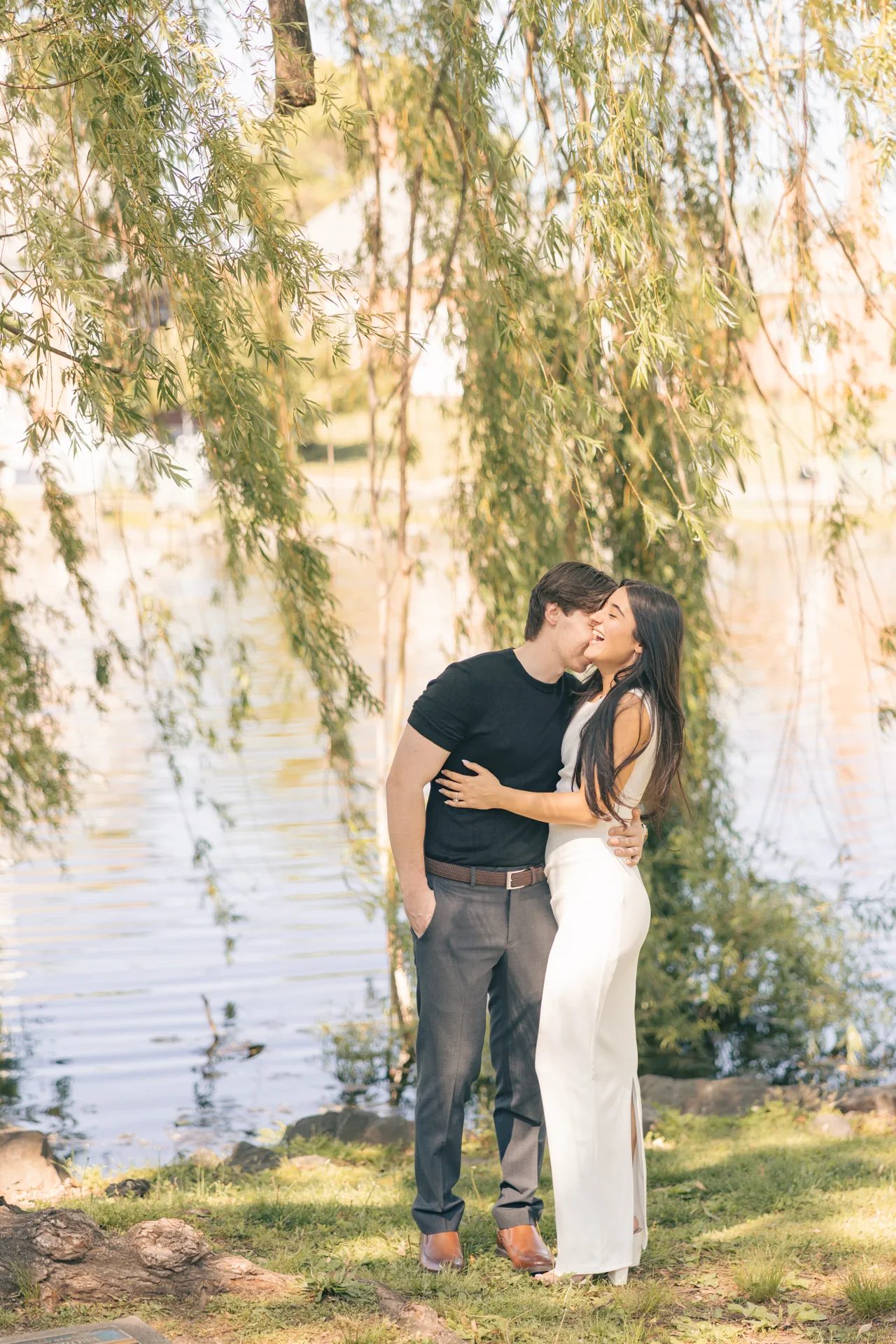 candid-laughing-bride-to-be-lakeside-engagement